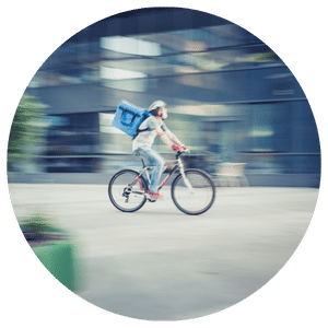 delivery worker riding a bike