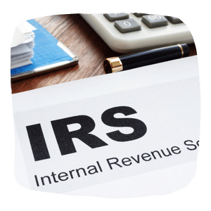 irs paper on table with calculator